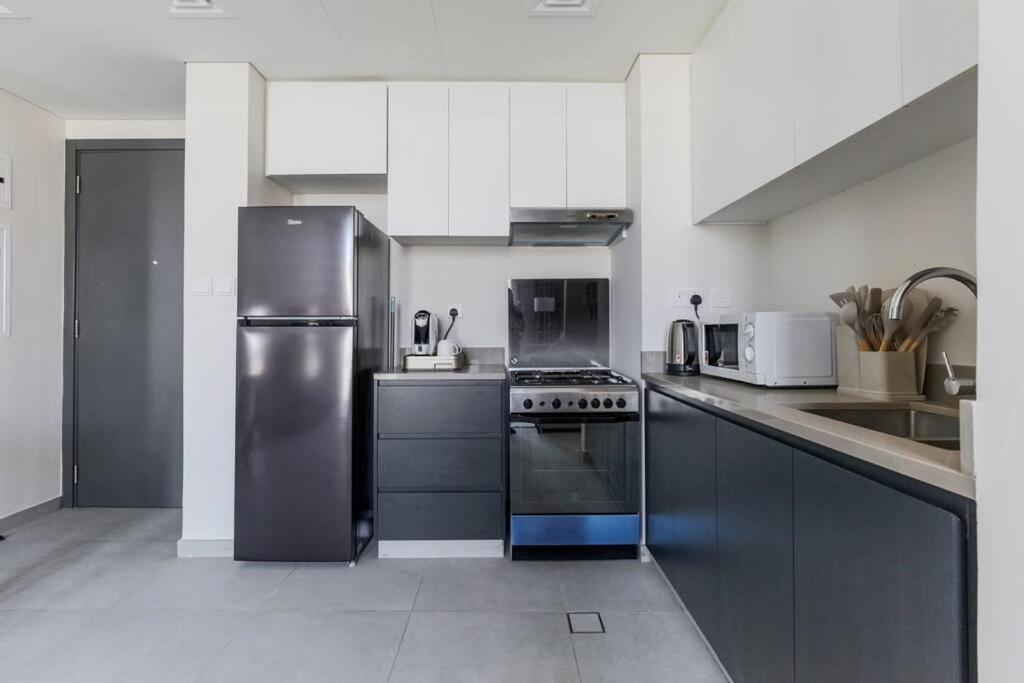 Sahab - Solo 1Br Apt In Al Jada 沙迦 外观 照片